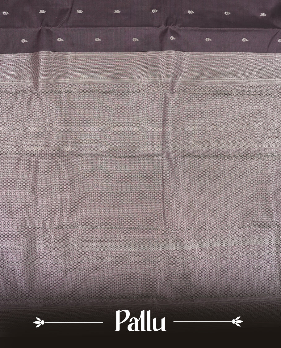 Purple taupe colour semi soft silk saree featuring a gold peacock & floral motifs body, complemented by gold traditional pallu & border and a matching blouse piece.