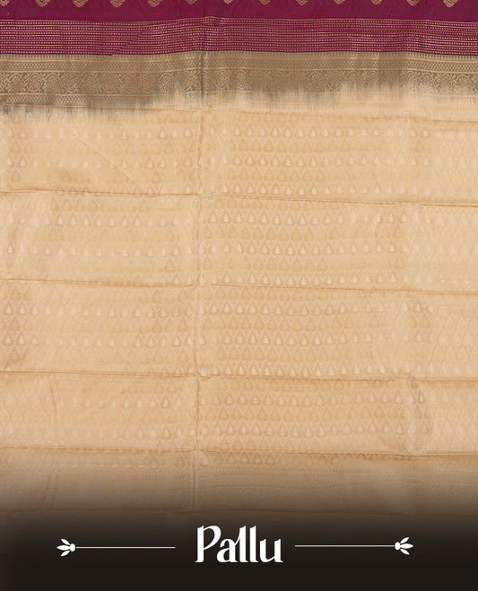 Burgundy colour Semi Silk Saree with gold zari striped patterns on the body, paired with a contrasting cream colour traditional pallu and border, and a matching blouse piece.