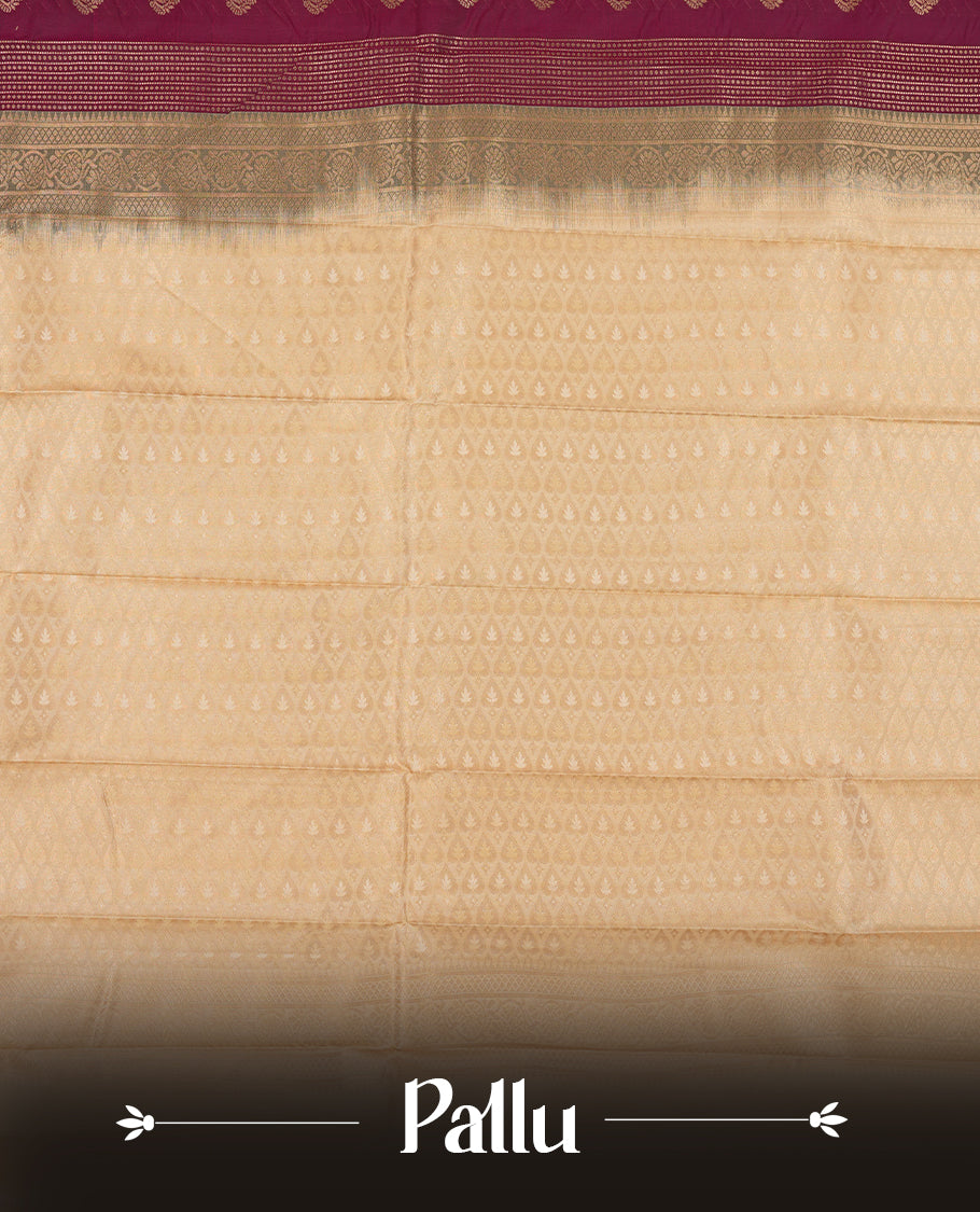 Burgundy colour Semi Silk Saree with gold zari striped patterns on the body, paired with a contrasting cream colour traditional pallu and border, and a matching blouse piece.