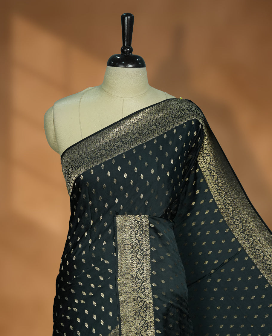 Deep Forest Green Colour Semi Banaras Satin Crepe Saree featuring Gold Zari Woven Small Buti Motifs, Intricately Designed Traditional Banarasi Border, Richly Woven Pallu with Ornate Patterns & Matching Blouse Piece