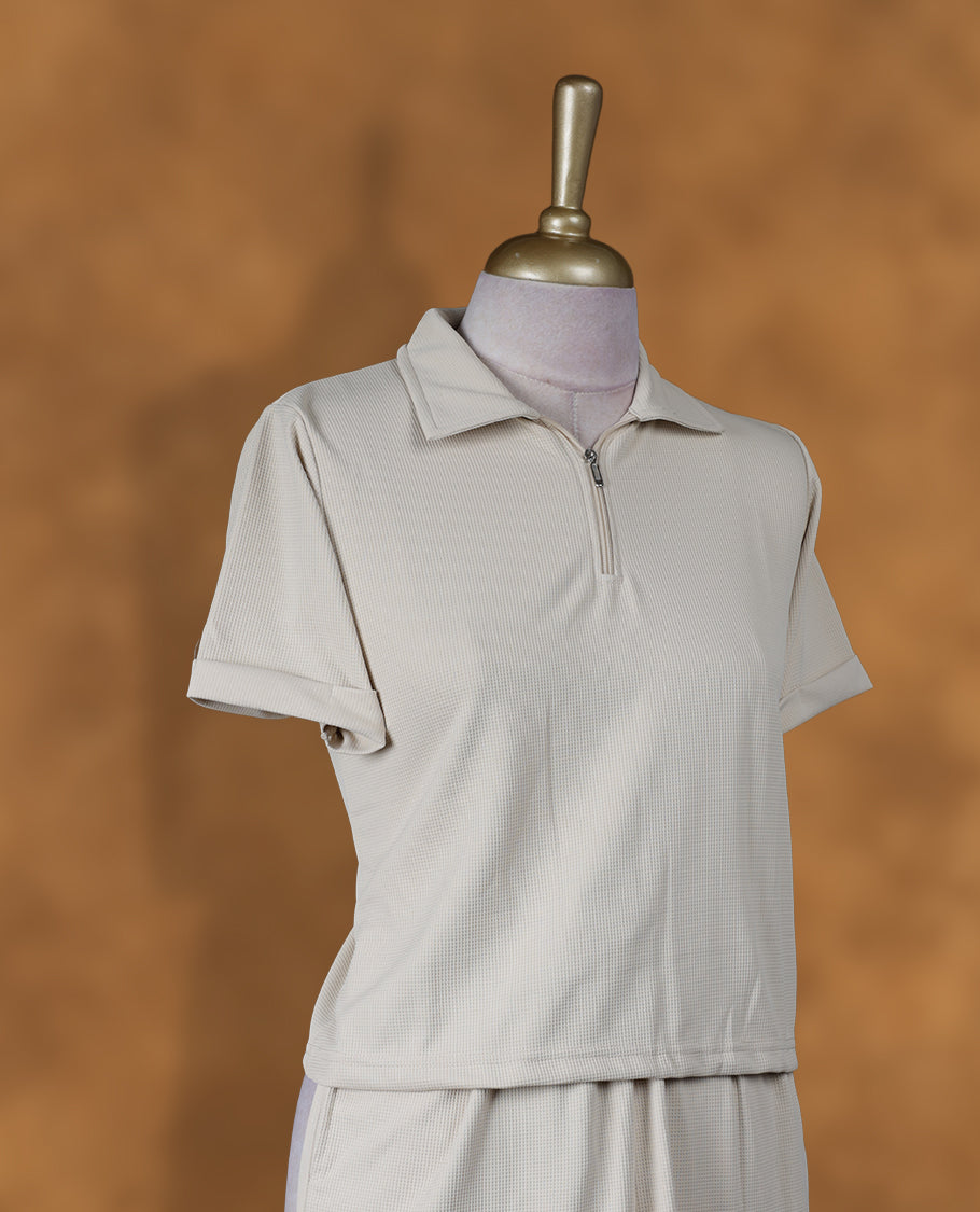 Cream colour coord set with collar neckline & zip details, short sleeve Tshirt design and matching pant