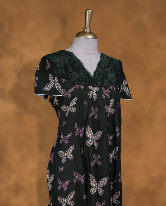 Dark green colour NStyle nighty featuring Butterfly patterns, a V neckline with design lace, short sleeves, and a full ankle-length design.