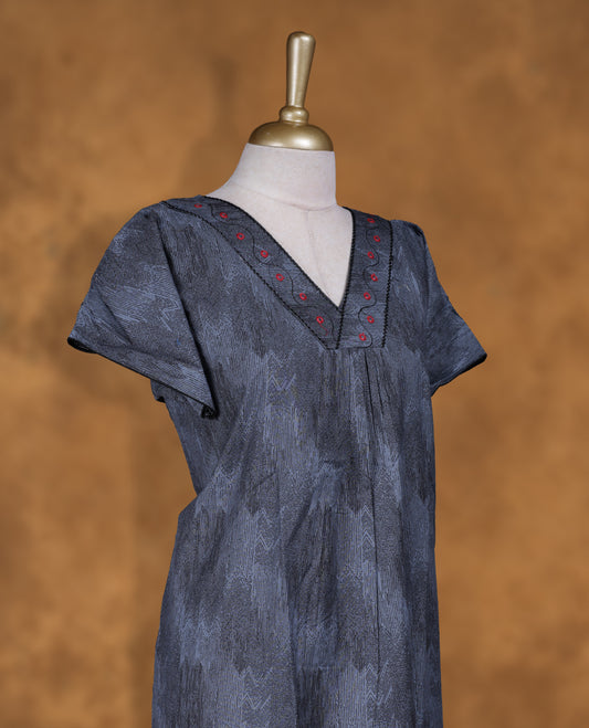 Ash blue colour NStyle nighty featuring BLack patterns, a V neckline with thread patern, short sleeves, and a full ankle-length design.