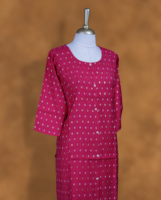 Rani pink colour kurti with styled with round neckline, print pattern across body, knee length design, and a sleeve .
