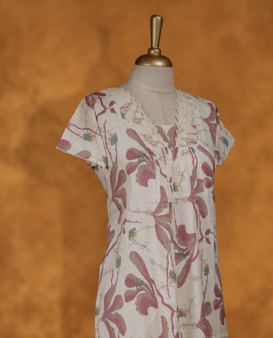 Off white colour NStyle nighty coloured featuring floral pattern, a V neckline with lace details , short sleeves, and a full ankle-length design.