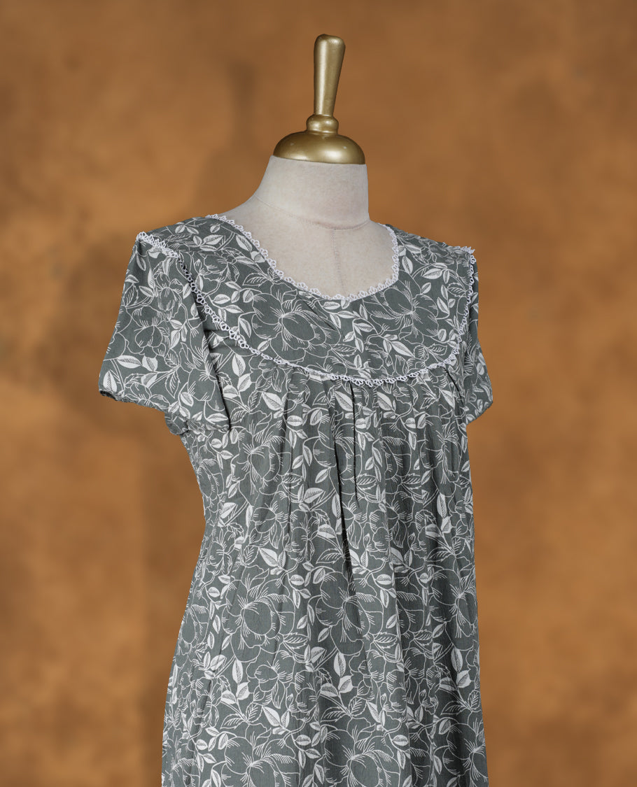Dark thyme colour NStyle nighty featuring white colour floral patterns, a Diamond neckline with thread details , short sleeves, and a full ankle-length design.