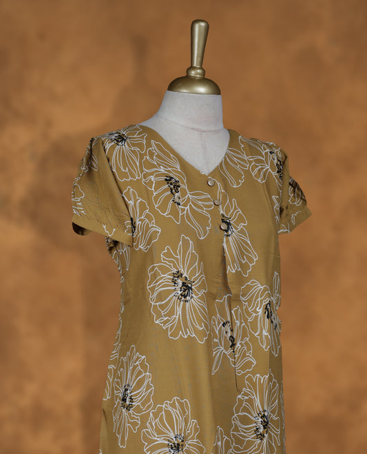 Mustard colour NStyle nighty featuring white floral patterns, a V-neckline with ruffled detailing, short sleeves, and a full ankle-length design.