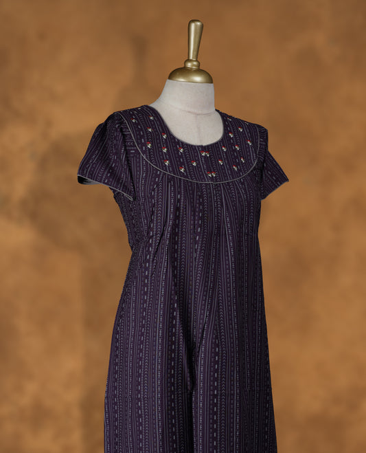Purple colour NStyle nighty featuring striped patterns, a round neckline with floral embroidery detailing, short sleeves, and a full ankle-length design