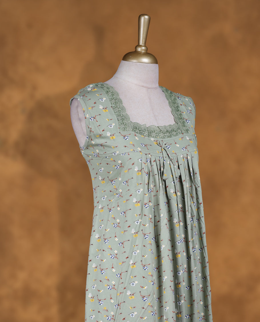 Olive green colour Nstyle nighty with featuring a floaral pattern, a Square neckline with lace detailing, sleeveless, and a full-length