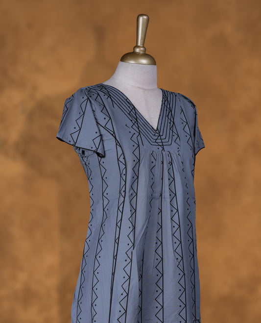 Ash blue colour NStyle nighty featuring black geometric patterns, a V-neckline with stitching detailing, short sleeves, and a full ankle-length design.