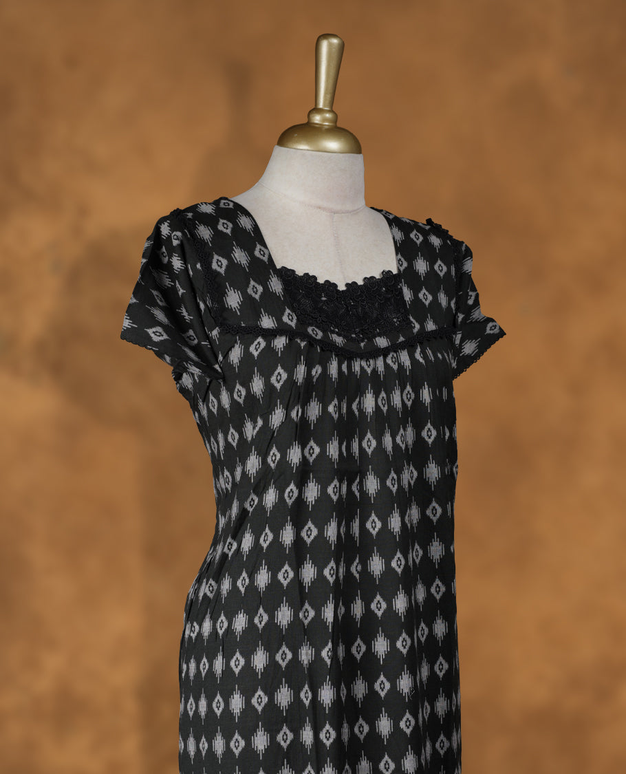 Black colour NStyle nighty featuring white diamond patterns, a Diamond neckline and lace border, short sleeves, and a full ankle-length design.