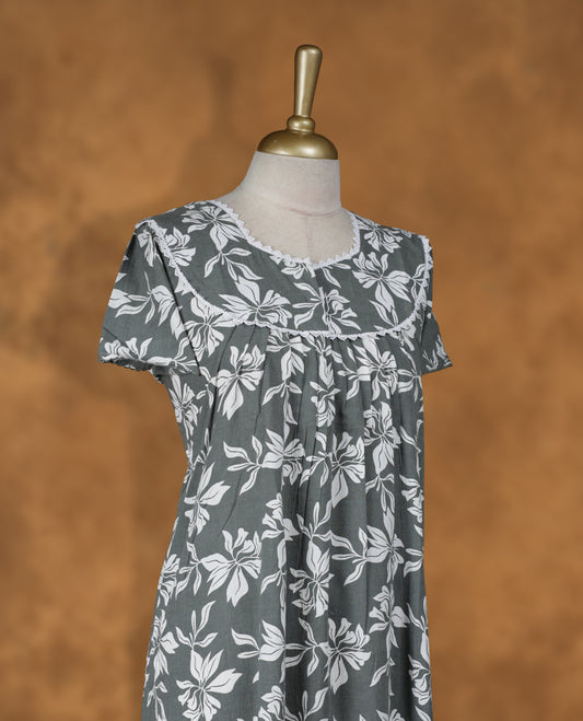 thyme green colour NStyle nighty featuring white colour floral patterns, a Diamond neckline with lace  details , short sleeves, and a full ankle-length design.