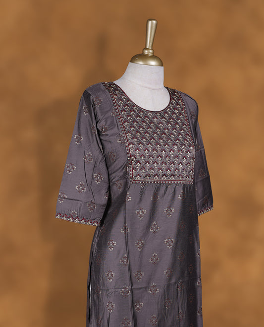 Dark ash colour kurti with styled with a thread pattern around neckline & print pattern across body, knee length design, and a sleeve .
