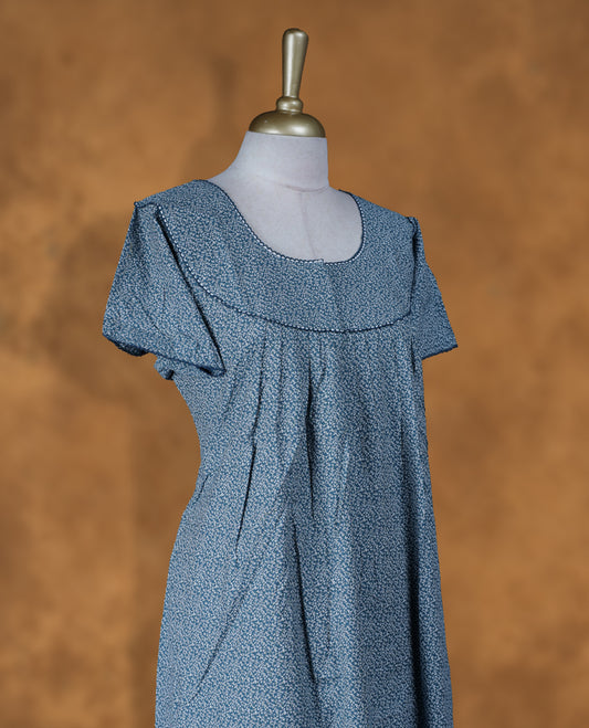 Dark aqua Green colour NStyle nighty featuring white floral  patterns, a Round-neckline with thread border, short sleeves, and a full ankle-length design.