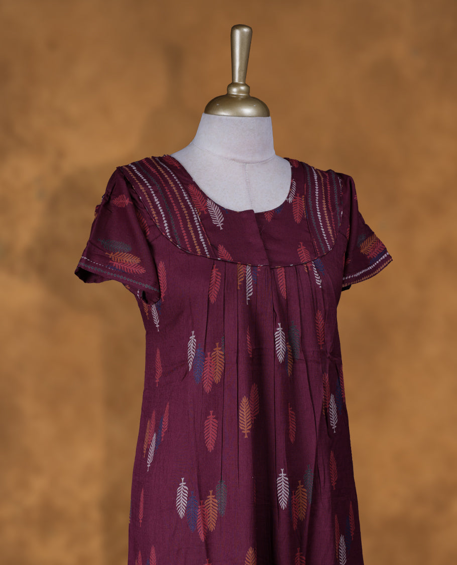 Wine Burgundy Nighty Featuring Elegant Feather Patterns, Round Neckline with Lace Border, Short Sleeves, and Full Ankle-Length Design
