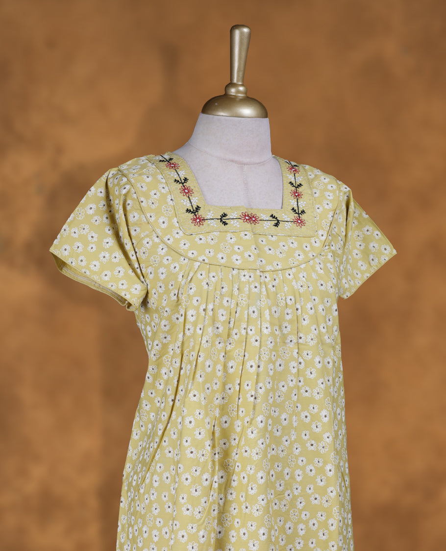Lime green colour NStyle nighty featuring Cream Leaf patterns,a Square neckline and thread design, short sleeves, and a full ankle-length design.