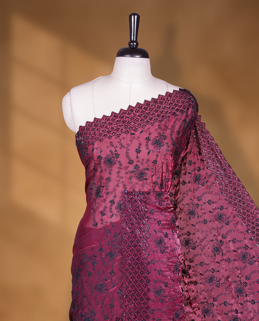 Burgundy colour velvet chiffon designer saree, featuring black thread embroidery kodi pattern on body with black cut stone work and heavy stone border, pallu and Paired with matching blouse.