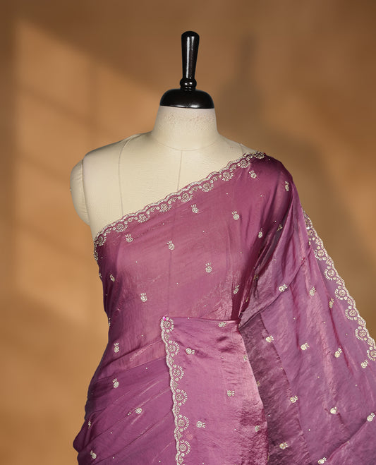 Onion Colour velvet Chiffon Designer Saree featuring Delicate White Stone motifs on Body, with Stone Detailing on the Border and Pallu, paired with a Matching Blouse.