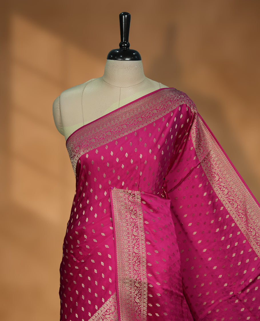 Magenta Colour Semi Banarasi Satin Crepe Saree with Gold Zari Buti Motifs, Traditional Gold Floral Pallu, Elaborate Woven Border, Decorative Tassels with Matching Blouse
