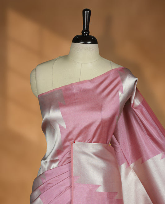 Pink and silver colour dual tone semi tussar saree featuring woven abstract geometric motifs on the body, complemented by a ikat inspired contrast Aqua green patterned pallu, paired with a matching blouse.