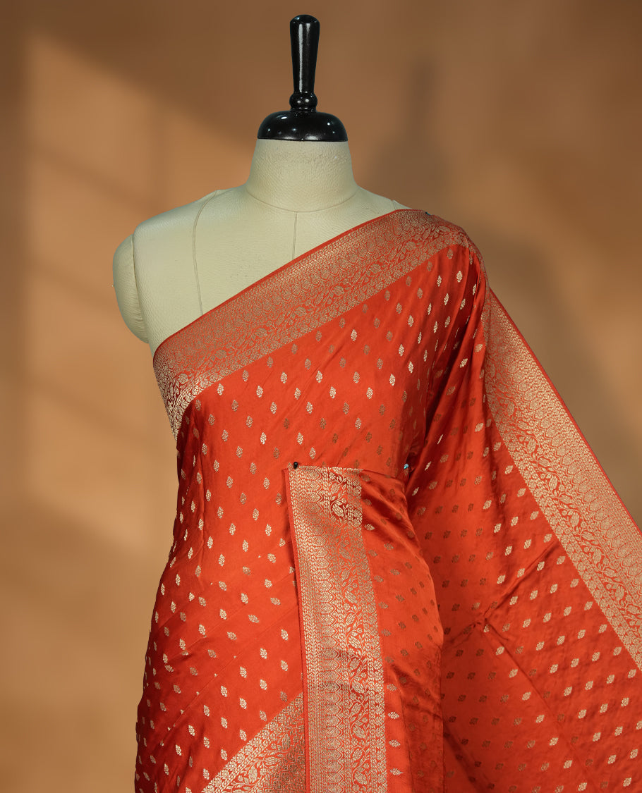 Orange Colour Semi Banarasi Satin Crepe Saree with Silver Zari Buti Motifs, Traditional Gold Ornate Pallu, Elaborate Woven Border, Decorative Tassels with Matching Blouse