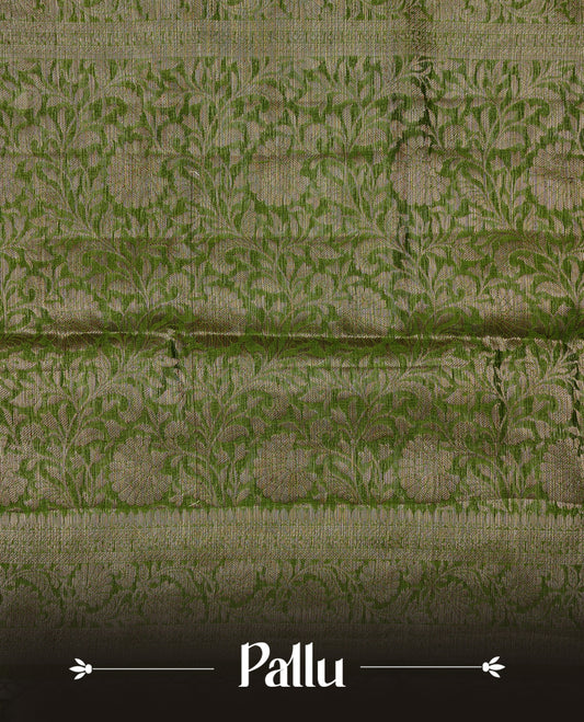 Light green colour Banaras silk saree featuring gold zari Geometric pattern on body, complemented by contrast green colour with zari border, comes with matching blouse piece.