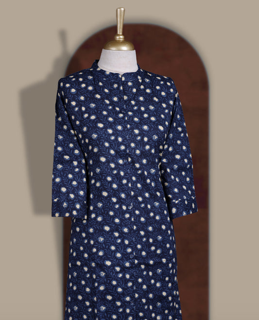 Navy blue colour coord set with beige prints all over, featuring a smart mandarin collar and 3/4 sleeves, Paired with matching straight pants, this set blends comfort and elegance for a stylish everyday look.