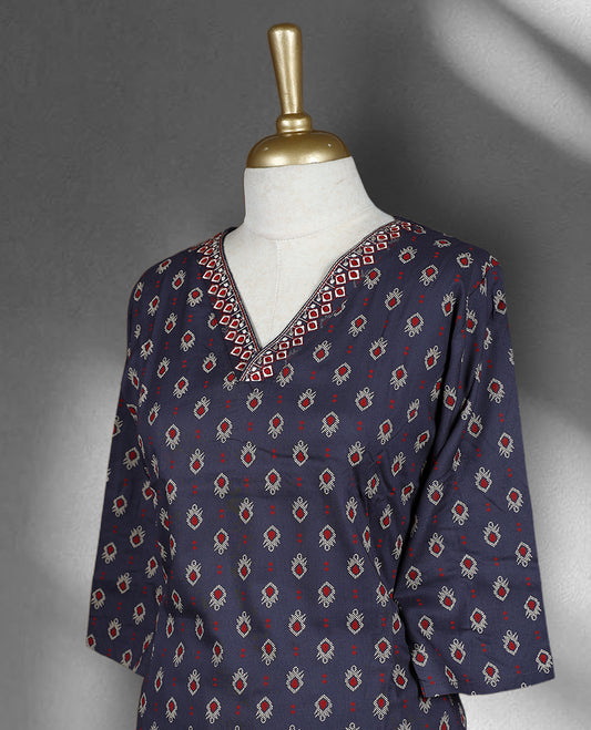 Navy blue colour cord set with all over traditional motifs, featuring a V neck top with embroidered detailing and matching straight fit pants.