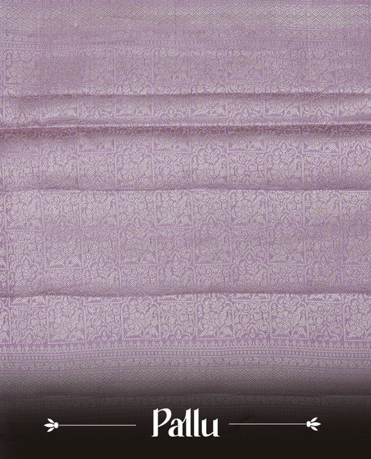 Light Purple colour banaras saree featuring silver zari buttas on body, complemented silver zari on self colour border, comes with matching blouse piece.