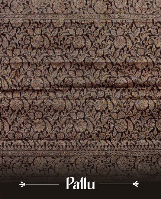 Maroon colour Banaras silk saree featuring gold zari buttas on body, complemented by contrast chocolate colour border, comes with matching blouse piece.
