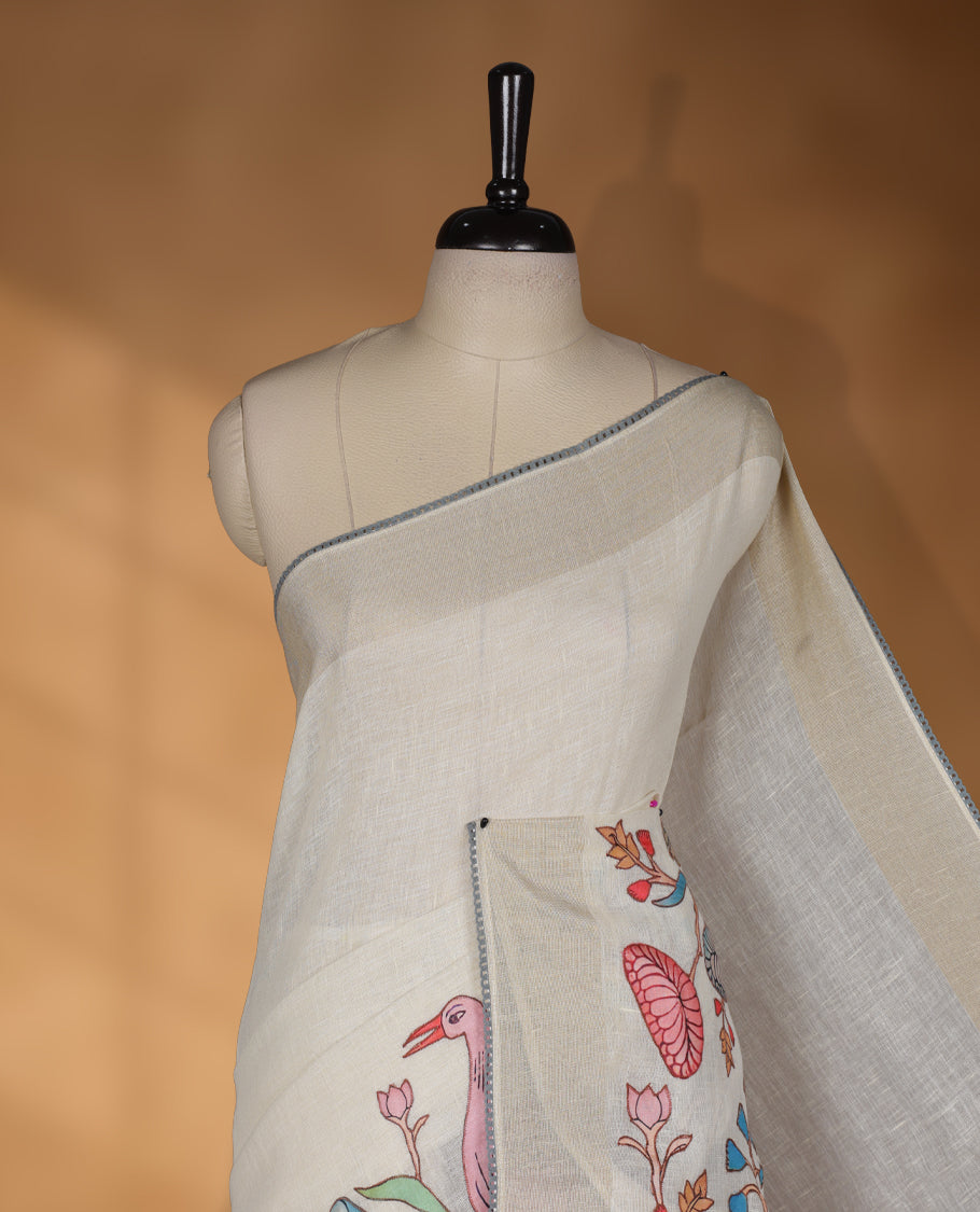 Cream colour cotton linen silk saree featuring Floral  & brids printed pattern on body, golden simple border with gray colour pallu and comes with a matching blouse