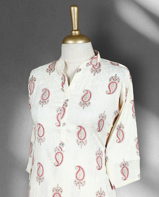 Off white colour Cord set with red and beige colour mango print on body, featuring a V neck top with a straight and side slits, paired with matching straight fit pants.