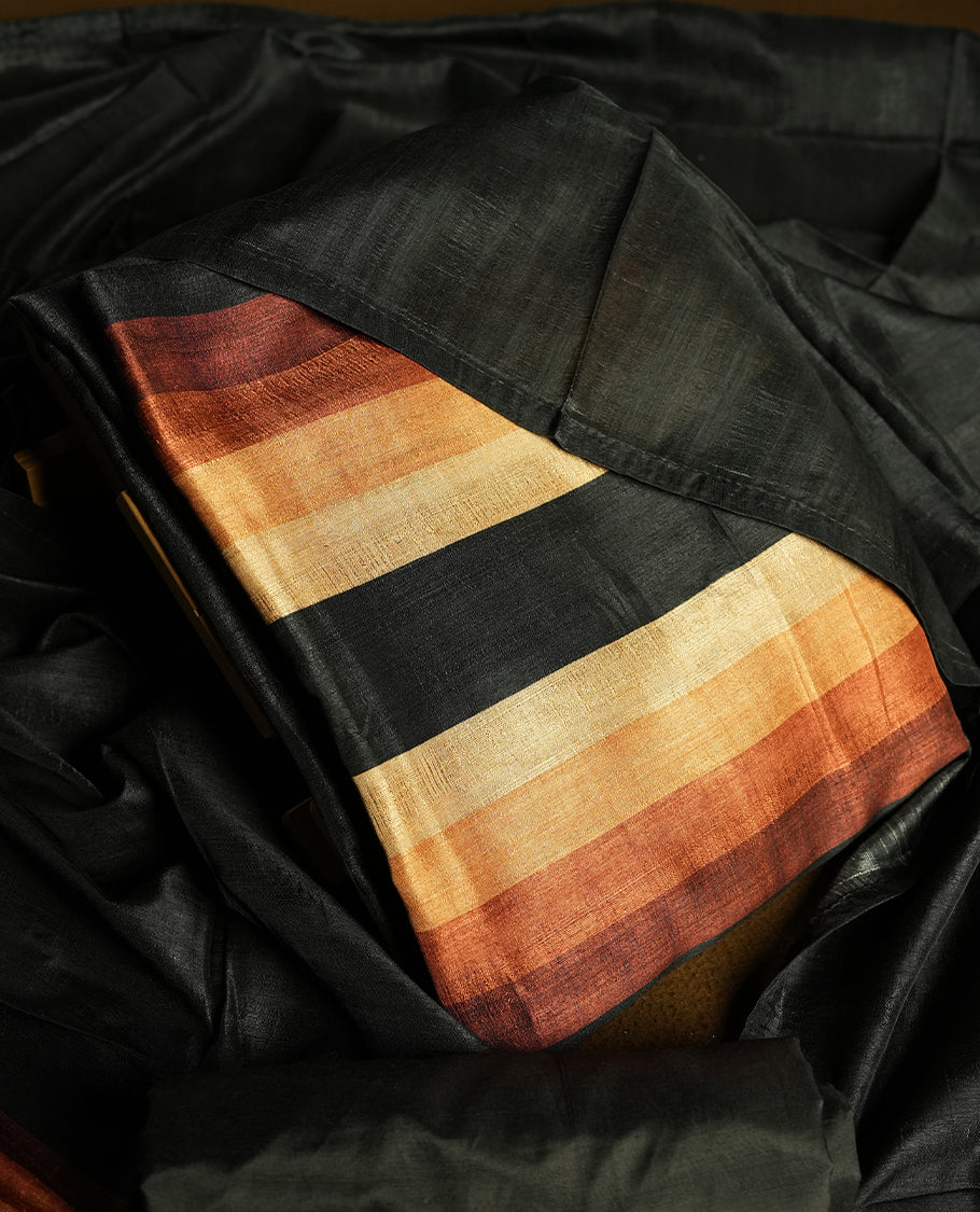 Black colour churidhar material featuring elegant horizontal stripes on the yoke and dupatta, woven in shades of Brown and Black & Paired with a matching plain bottom