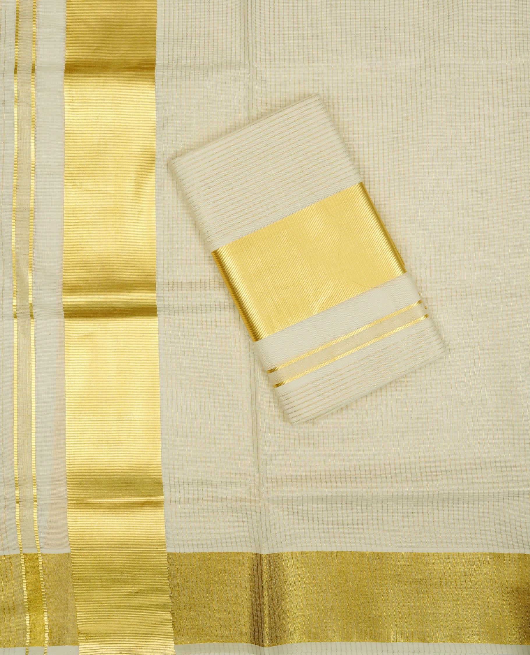Cream colour cotton Set Mundu With Gold zari Strips on body, enhanced with Classic gold kasavu kara.
