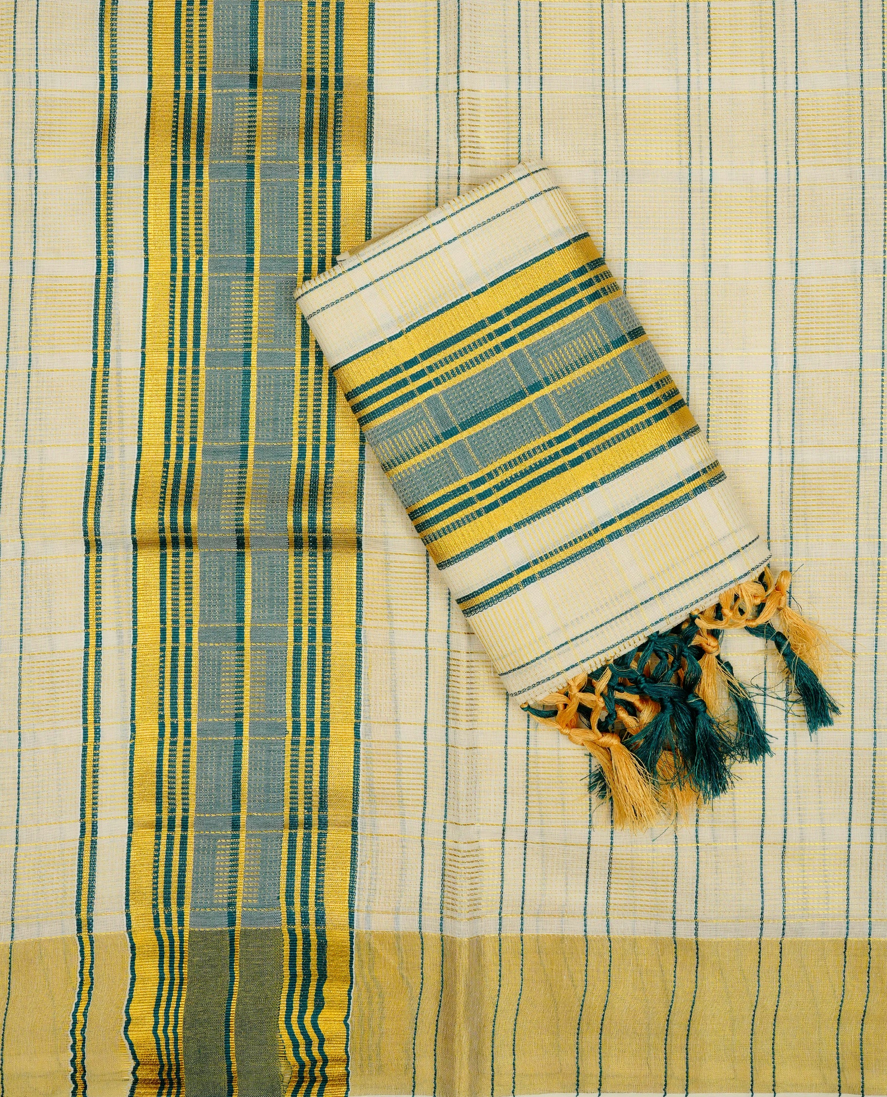 Cream colour Cotton set mundu With Gold zari Checks on body, enhance gold zari  with Teal colour kara.