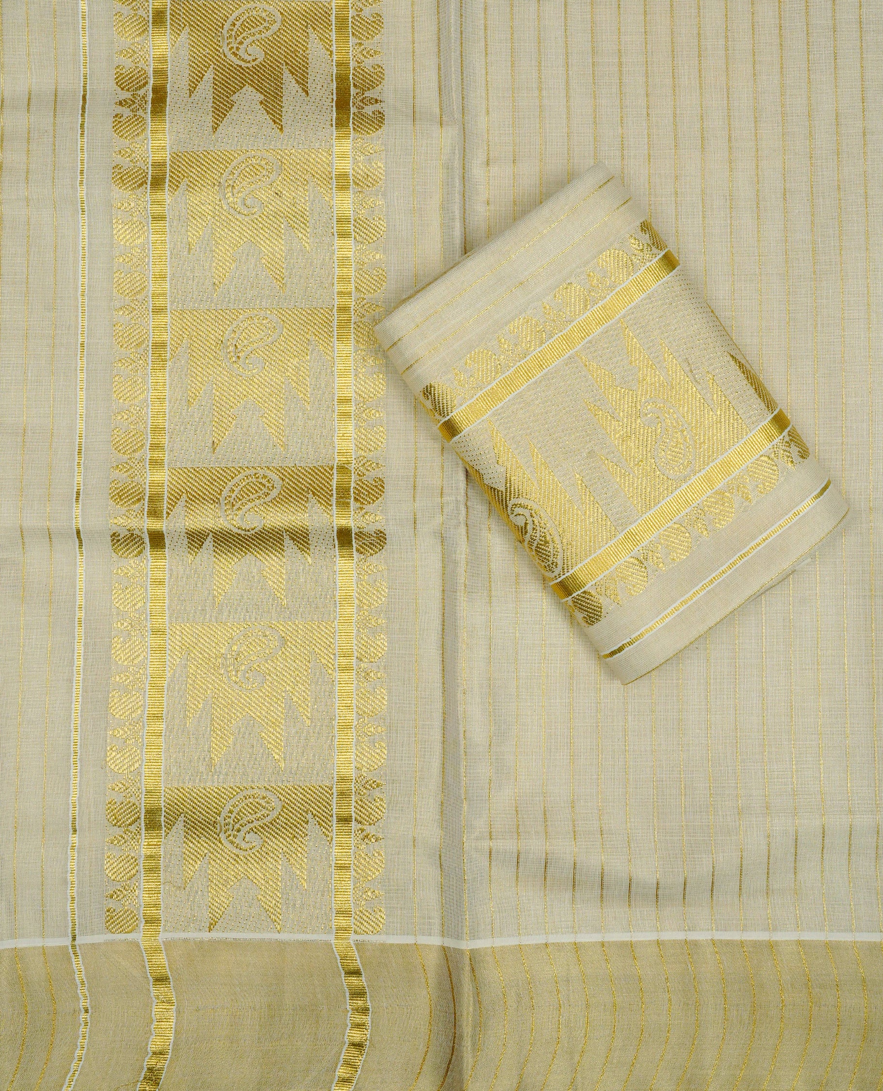 Cream Colour tissue set mundu featuring a Striped body, enhanced with Gold Zari Design & gold zari kara.