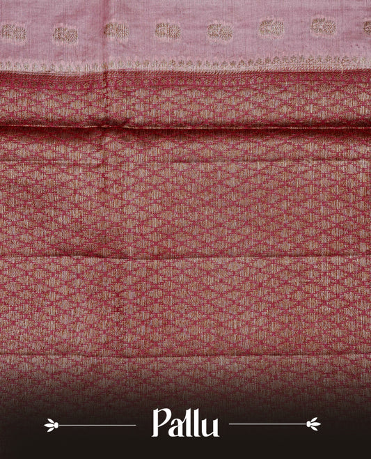 Light peach colour banaras silk saree featuring Gold zari buttas on body, complemented by contrast maroon colour border, comes with matching blouse piece.