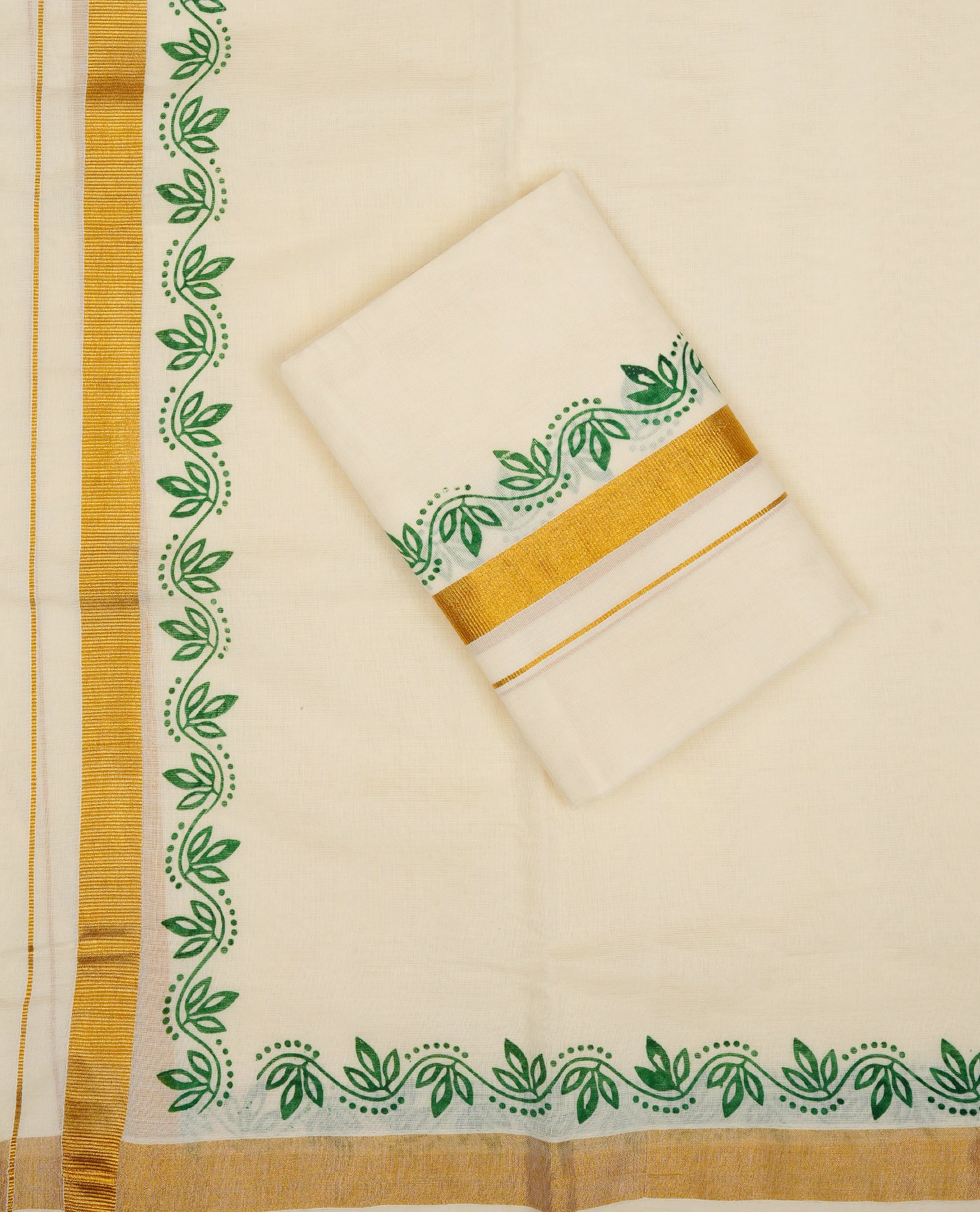 Cream colour Cotton set mundu With plain body, enhance gold zari with Green colour floral kodi kara.