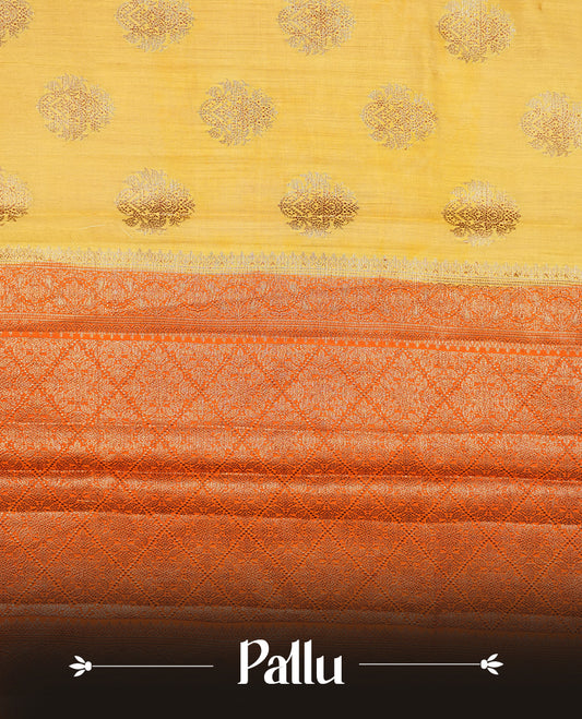 Gold Banaras soft silk saree with Antique zari motifs on body, with contrast Orange colour floral pattern on pallu, border, and Matching blouse.