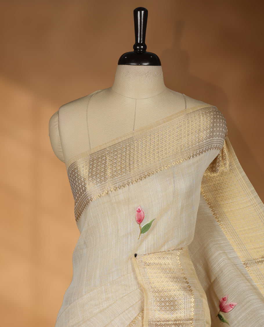 Beige colour Banarasi linen silk saree featuring hand brushed colour with Floral  & birds printed pattern on body, gold zari woven geometric design border with self colour pallu and comes with a matching blouse