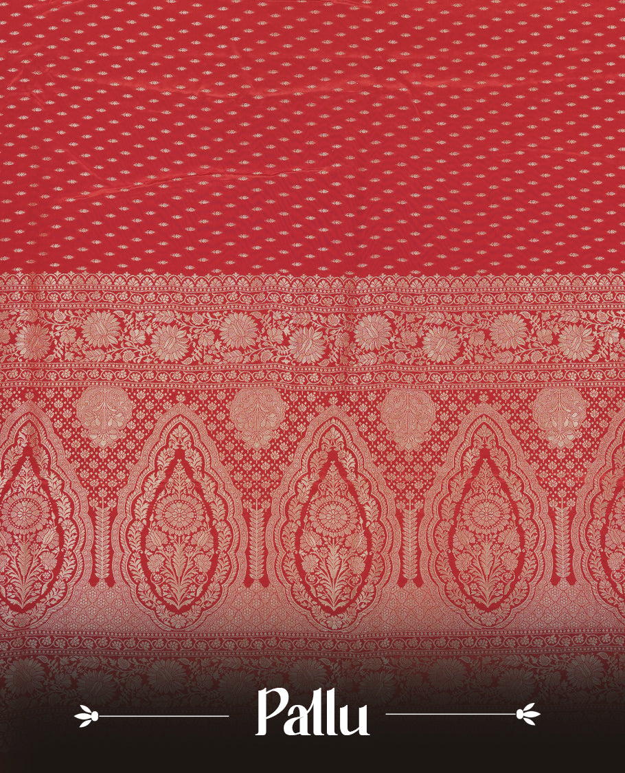 Bright red colour banaras satin crepe saree fearturing gold tiny leaf motifs on body, kodi visiri pattern on border & pallu and paired with matching blouse