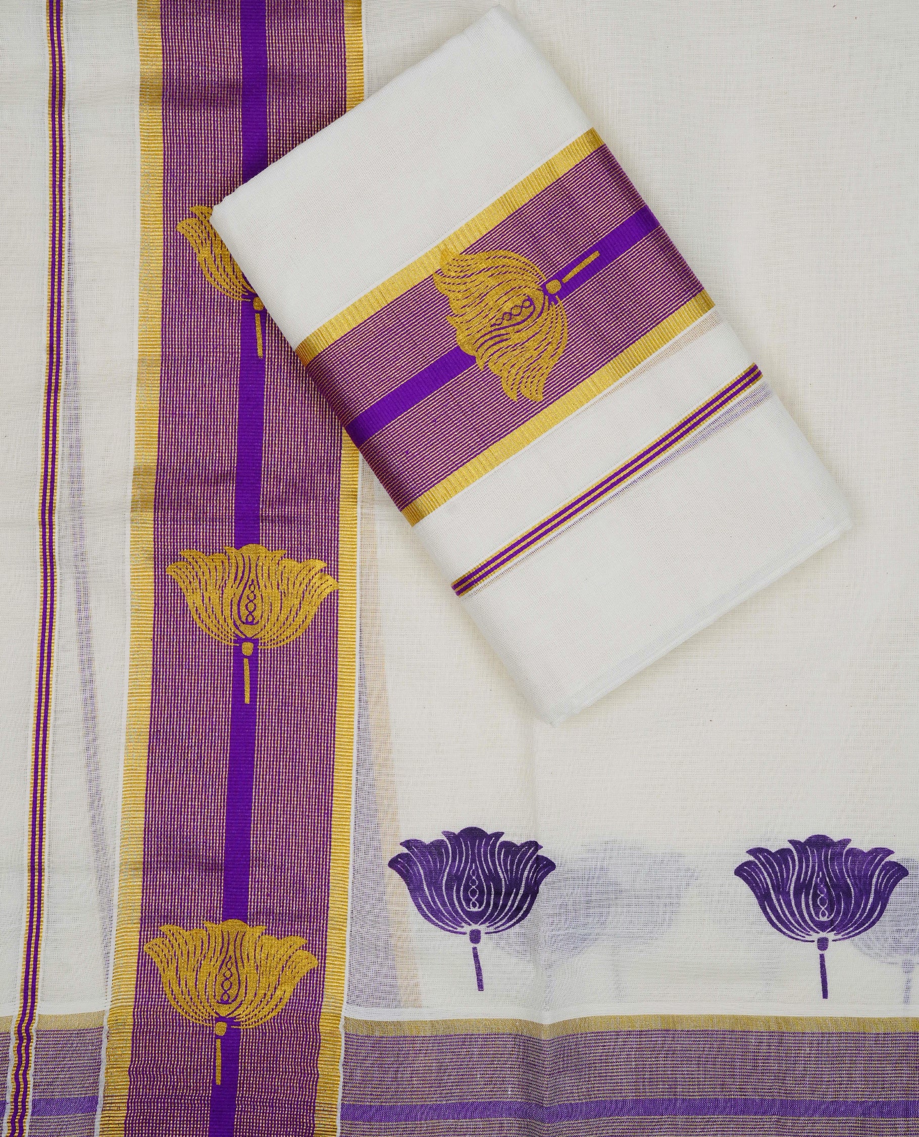 Cream colour cotton set mundu featuring Gold zari & purple border with floral Print.
