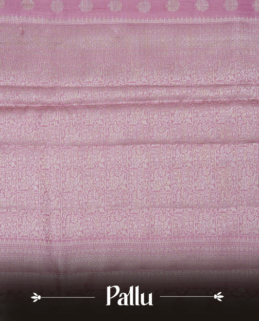 Light Pink colour banaras saree featuring silver zari buttas on body, complemented silver zari on self colour border, comes with matching blouse piece.