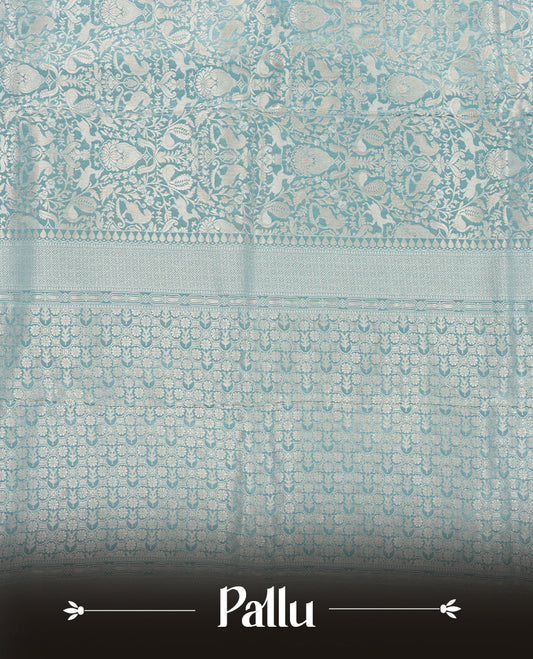 Light Blue colour Mysore Crepe Silk saree fearturing gold Zari kodi visiri & Animal brocade pattern on body and self colour border paired with matching blouse