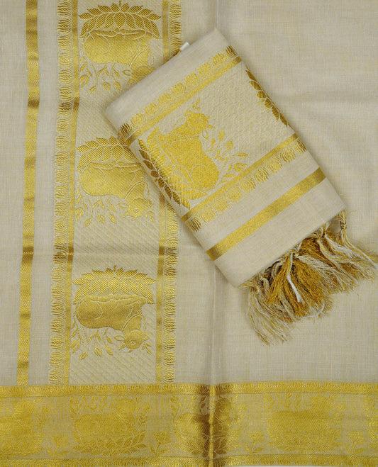 Light Gold Tissue set mundu featuring Gold zari design kara.
