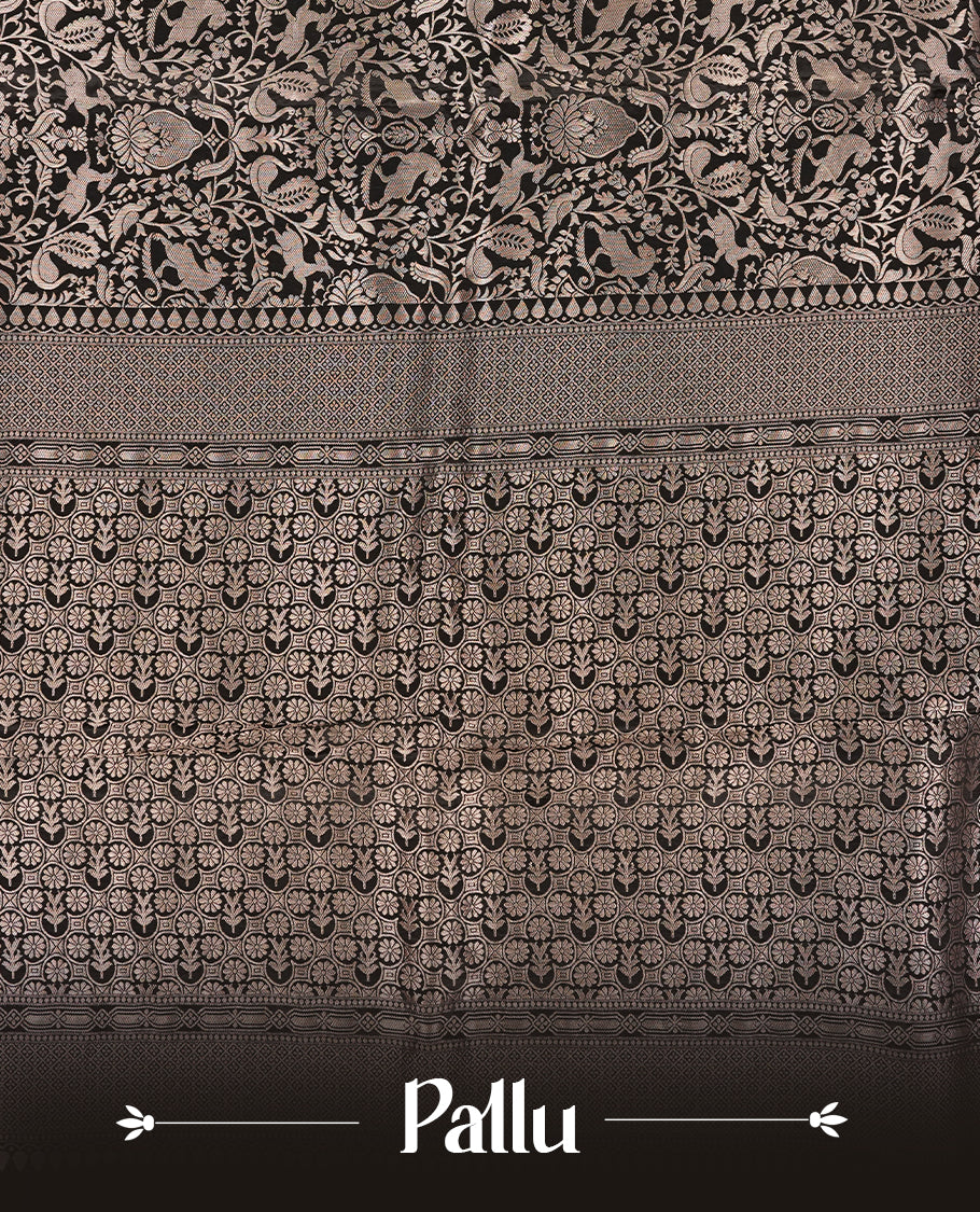 Black colour Mysore Crepe Silk saree fearturing gold Zari kodi visiri & Animal brocade pattern on body and self colour border paired with matching blouse