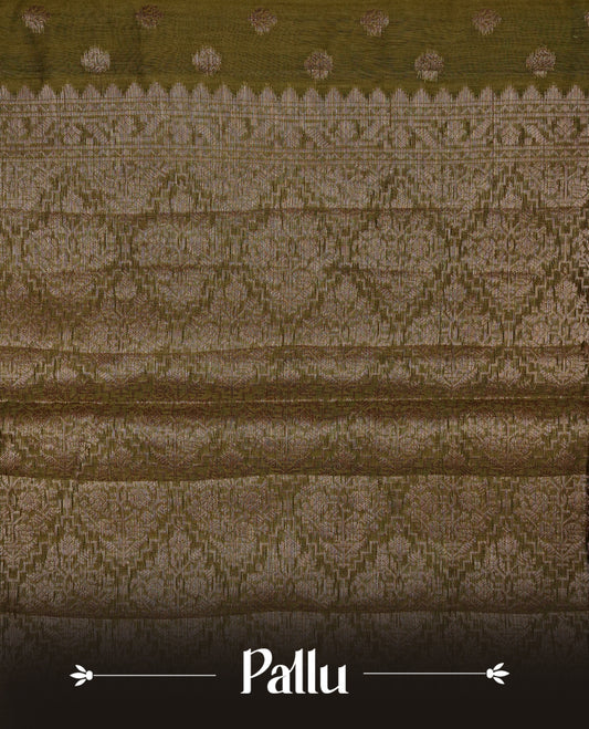 Olive green colour Banaras saree featuring Gold zari buttas on body, compelmented by zari pattern on self colour border, comes with matching blouse piece.