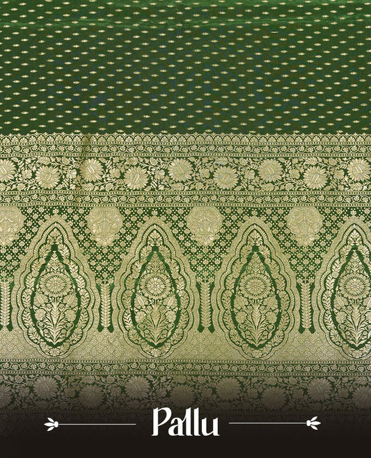 Green colour banaras satin crepe saree fearturing gold tiny leaf motifs on body, kodi visiri pattern on border & pallu and paired with matching blouse