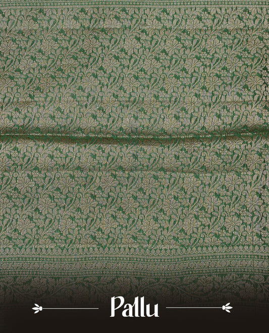 Pista green colour banaras silk saree featuring gold zari buttas on body, complemented by contrast Dark green with gold zari border, comes with matching blouse piece.