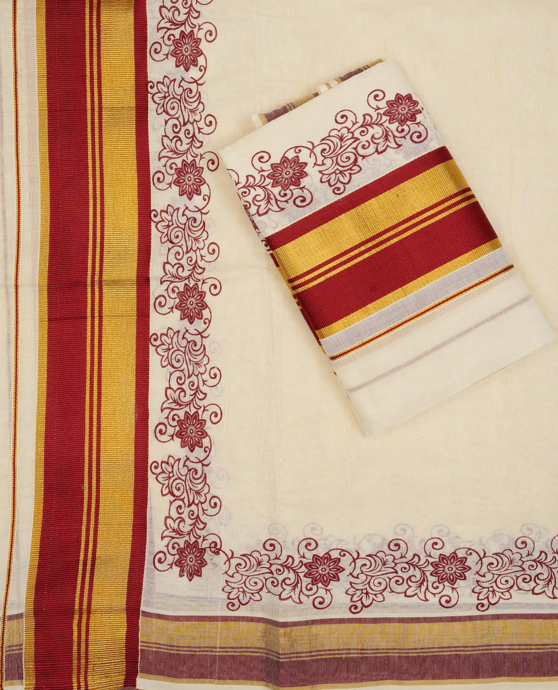 Cream colour Cotton set mundu With plain body, enhance gold zari with Maroon Floral print kara.